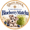Ceremonial blueberry matcha with a Schnauzer puppy and glass of matcha