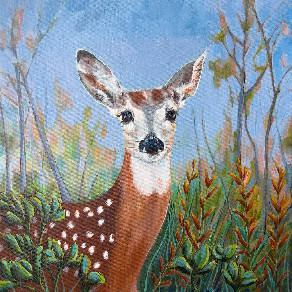 A painted portrait of a young deer with white spots, surrounded by green and orange foliage against a soft blue sky background.