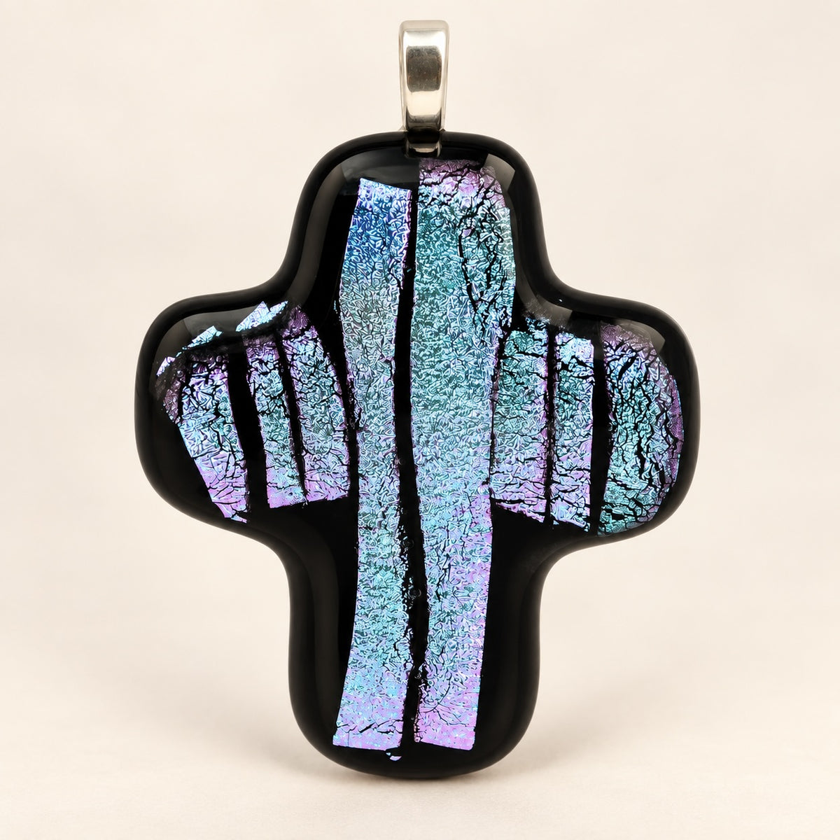 Handmade glass cross with a single color; each is unique.